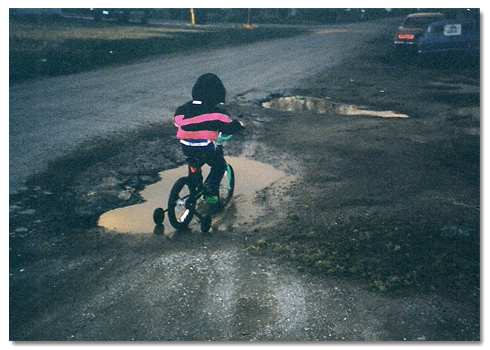 Brock riding his bike in the mud. Photo Brock Walquist riding his bike in the mud.